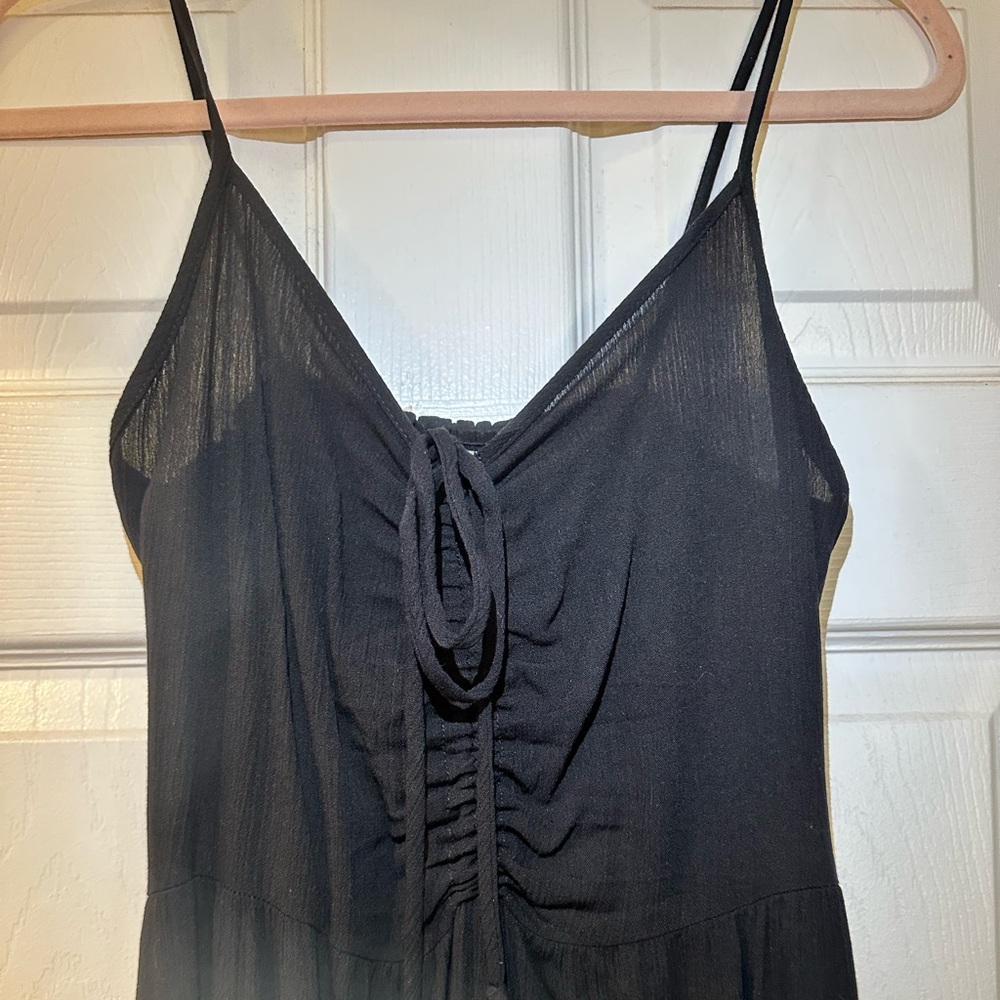 Mahina Black Jumpsuit ankle length with adjustable neckline.